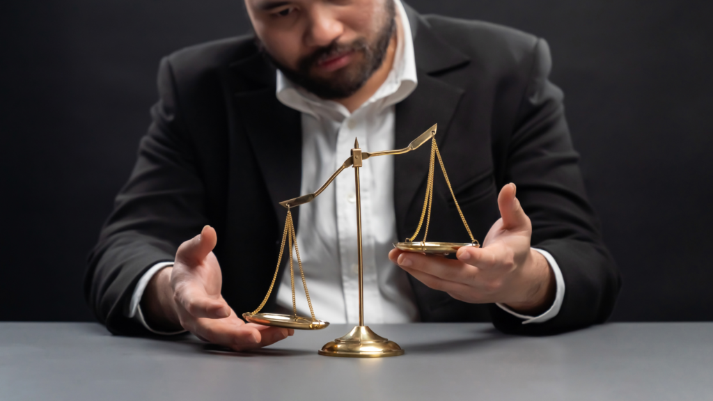 Man working to balance the scale.