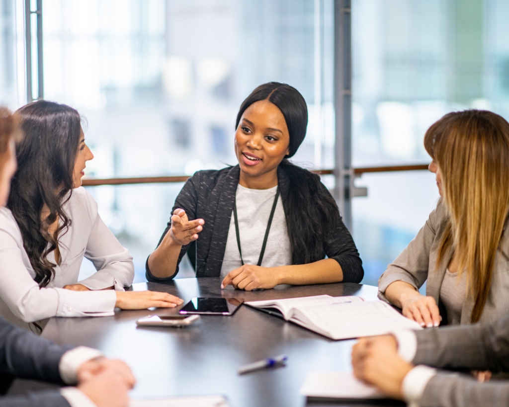 Professional Woman leading meeting